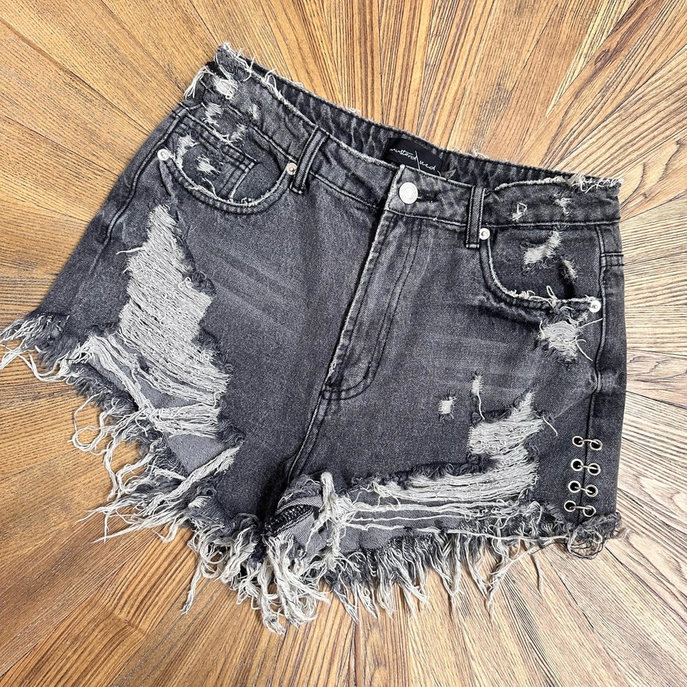 Distressed black denim shorts